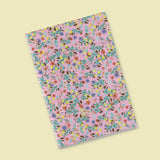 Petit carnet - Petites fleurs vives sur fond rose pastel